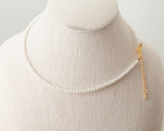 Pearl necklace finished in Gold