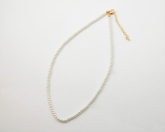Pearl necklace finished in Gold